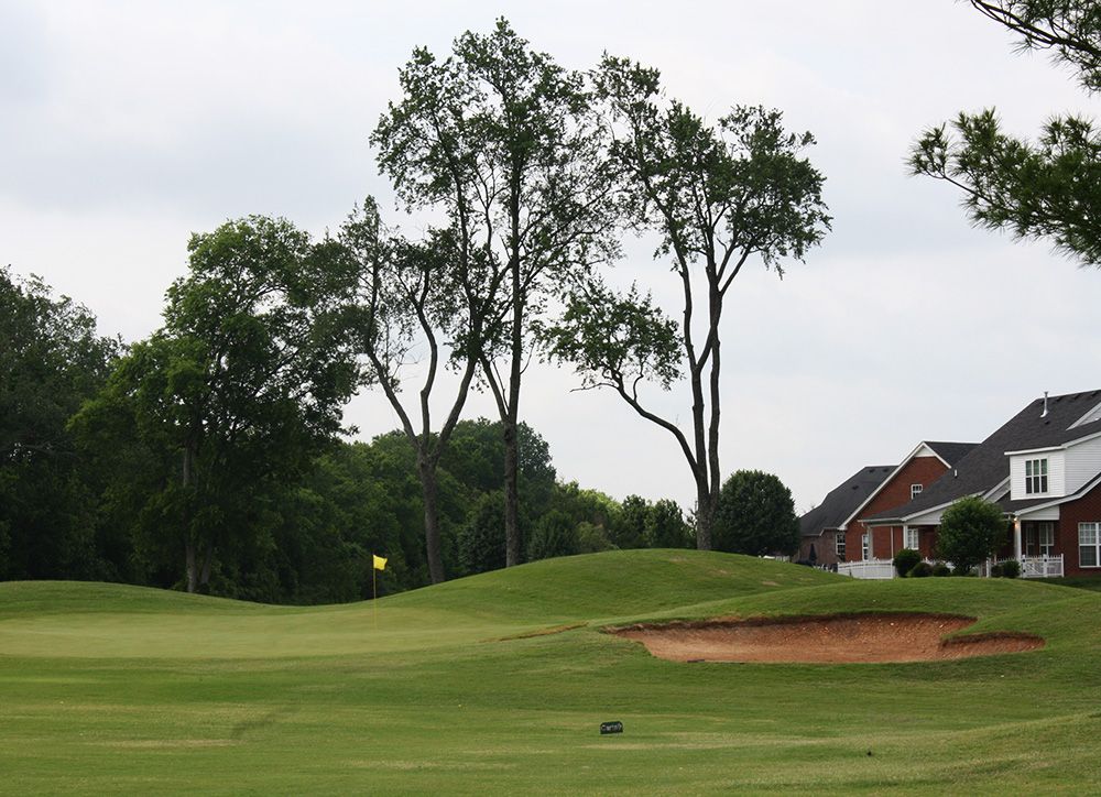 golf course green with sand trap